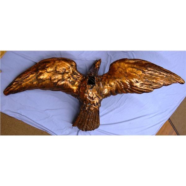 Life-size copper flying Eagle, 74" wingspan, hangs from the ceiling