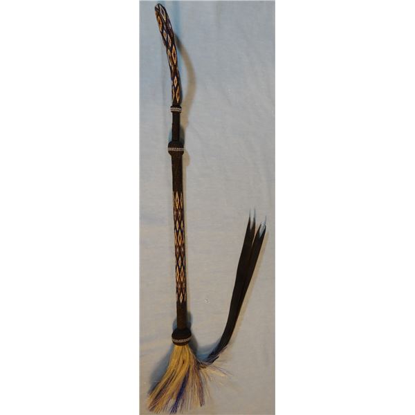 2 Deer Lodge horse hair quirts, black and black & white