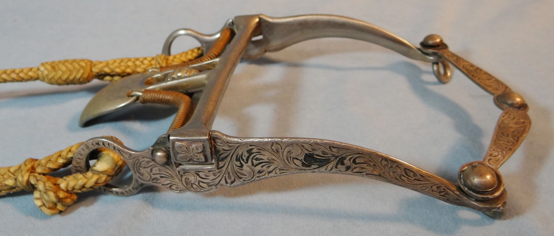 Braided rawhide one ear headstall w/Garcia silver mtd spade bit & romal