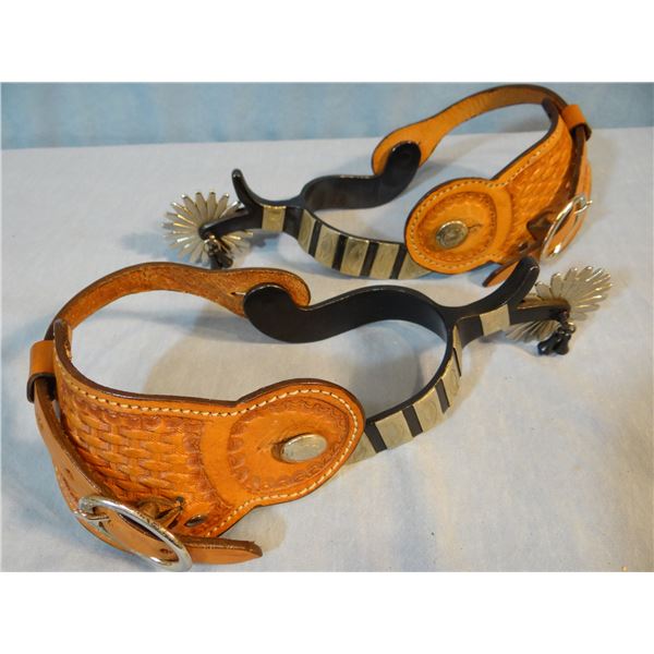 Black silver mtd spurs, like new, unmarked, chap guards and jingle bobs