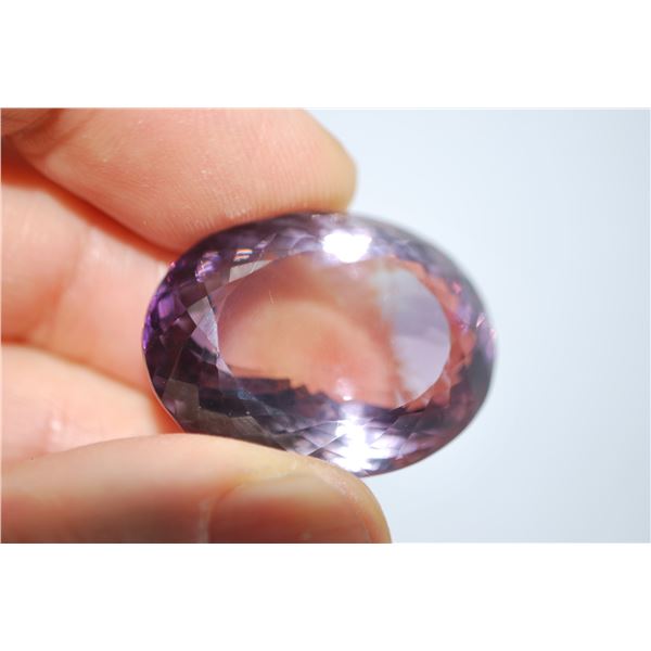 COLOSSAL 62.66 ct. AMETHYST