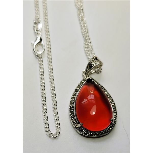 28)  PEAR SHAPED RED TITANIUM CRYSTAL WRAPPED