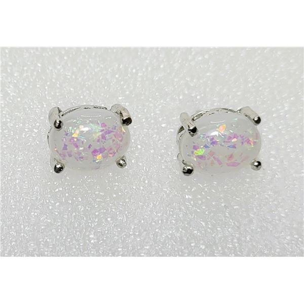 21)  SET OF WHITE OVAL LAB CREATED FIRE OPAL STUD