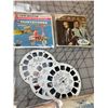 Image 2 : LOT OF VINTAGE REEL MASTER SLIDE REELS FLINTSTONES BUCK ROGERS ETC