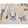 Image 4 : ziploc bag of vintage costume jewelry -necklaces, clip on earrings, brooches