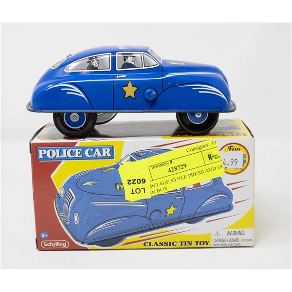 TIN VINTAGE STYLE PRESS AND GO CAR IN BOX