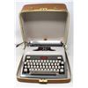 VINTAGE PORTABLE TYPEWRITER WITH CASE