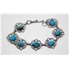 Image 1 : TURQUOISE AND SILVER TONE BRACELET