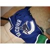 Image 3 : Metal Coat Rack and Canucks Jerseys Cat B