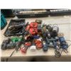 Image 1 : LOT OF ASSORTED POWER TOOLS INCLUDING ANGLE GRINDERS, HAMMER DRILLS, DRILLS, AND ASSORTED BATTERIES