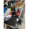 Image 1 : LARGE LOT OF ASSORTED CAR ITEMS INCLUDING TESLA CHARGER, 2 BOOSTER CABLES, PHONE GRIP MOUNTS,