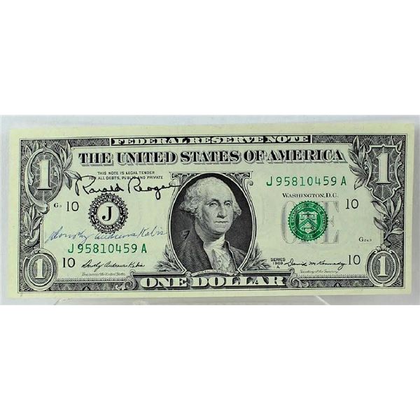 Ronald Reagan signed 1 dollar bill.