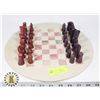 Image 1 : STONE CHESS SET ON ROUND BOARD