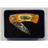 Image 1 : COLLECTOR WOLF BONE HANDLE-STYLE FOLDING KNIFE