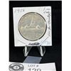 Image 1 : 1956 Canadian Silver Dollar in 2x2 Holder. Coin in Great Shape