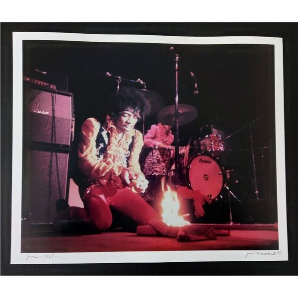 Photographer: Jim Marshall - Jimi Hendrix setting his guitar on fire, 1967.