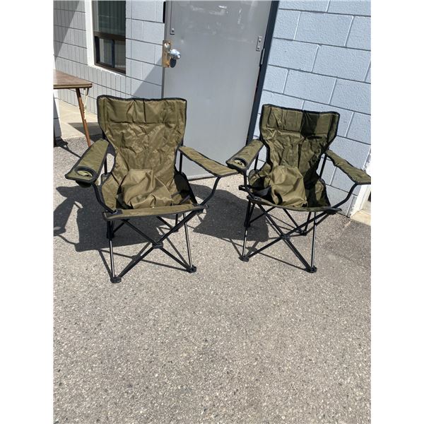 Two folding chairs with bags