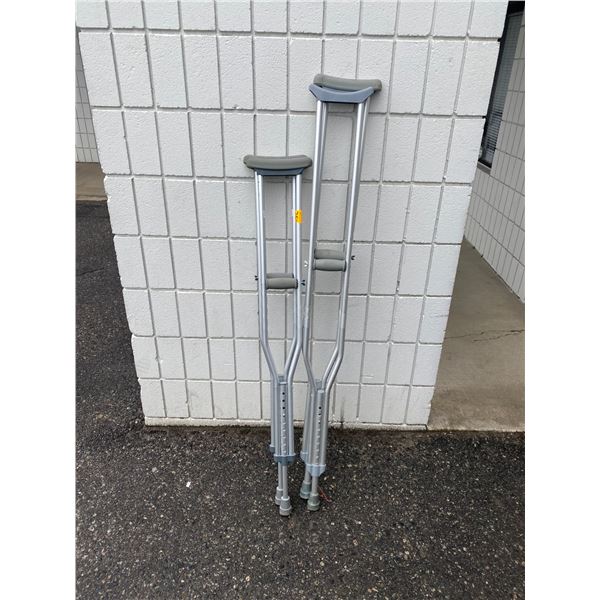 Two pair adjustable crutches