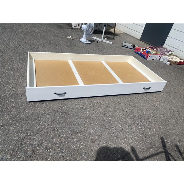 On wheels under the bed storage