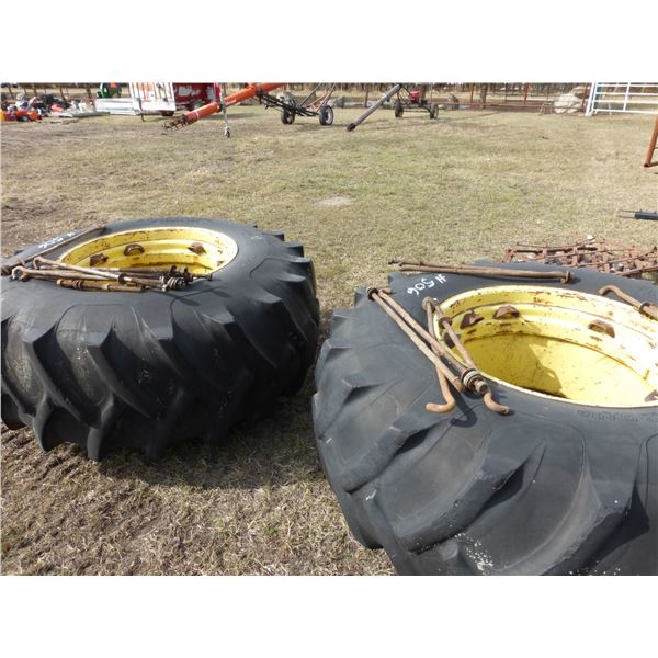 2- 24.5 x 32 Tires c/w Lugs, J.D.