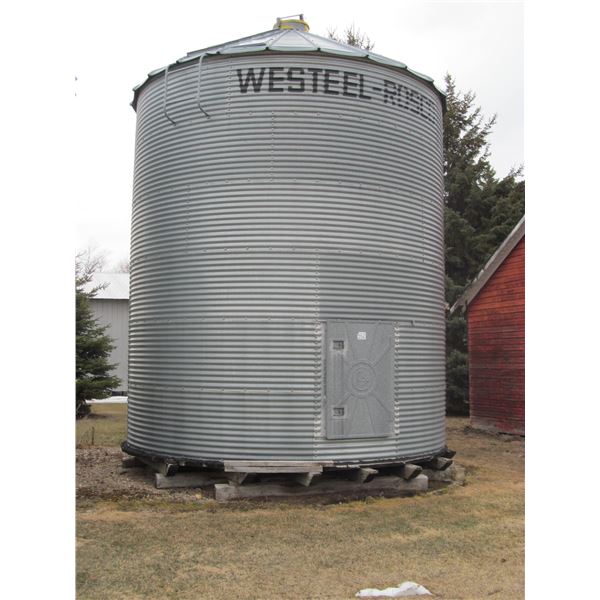 6 ring 14' Westeel on wood floor, c/w opener, good floor except for a 4" hole (Located 1.5 miles sou