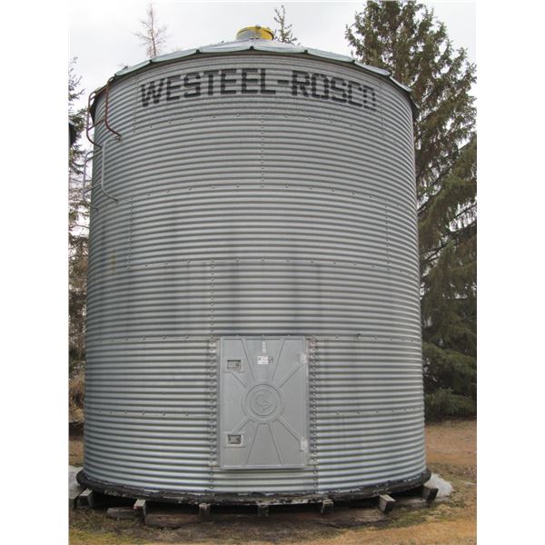 6 ring 14' Westeel on wood floor, c/w opener and partial ladder. Good floor (Located 1.5 miles south