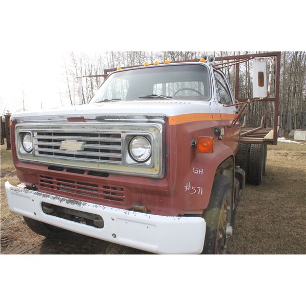 1982 Chev Tandem Axle, 5 & 4 Trans V8, c/w Deck for Hauling Rnd Bales and Hoist, 10.0x20s Tires, SN.