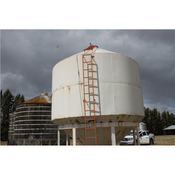 2 Ring Fertilizer Bin (Bolted to Concrete) Located; from Auction Yard, 9 km North on RR 214  to Twp 
