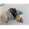 Image 2 : Super nes power adapter + controller + gamecube + xbox controllers