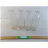 Image 1 : (4) tall milk bottles