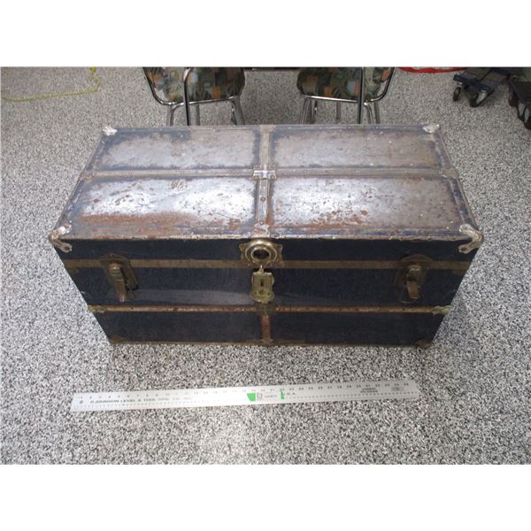 Metal chest with christmas lights inside