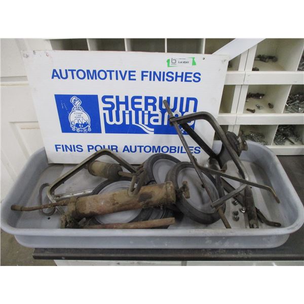 Sherwin sign with wagon wheels, grease gun, misc