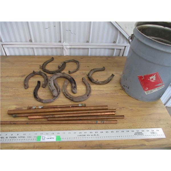 Copper pipe with horse shoes