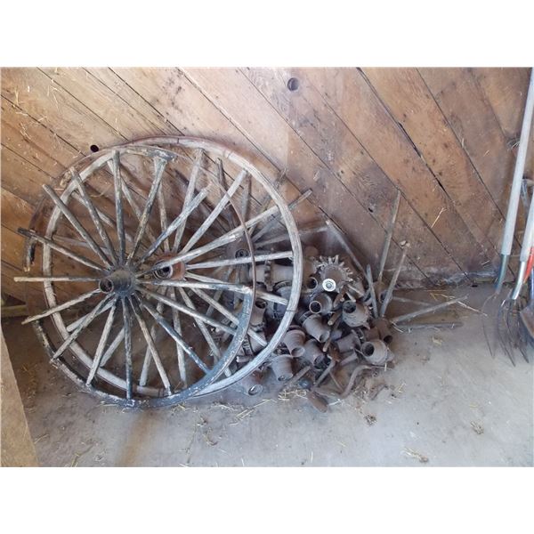 (2) Buggy wheels + large pile of antique buggy hubs?