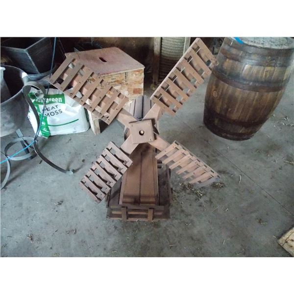 Wooden windmill lawn ornament