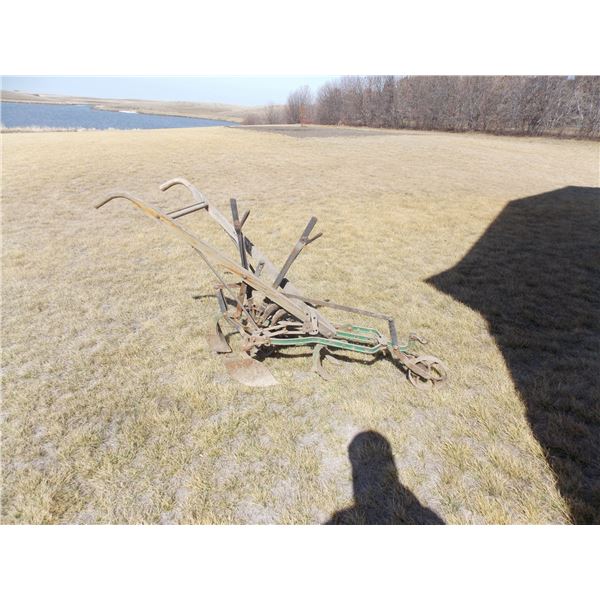 Antique hand plow – wheeled