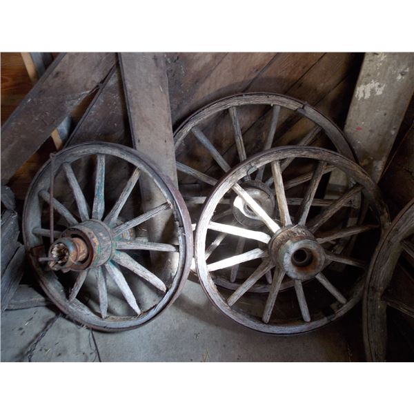 Three medium wooden wagon wheels - 36" diameter