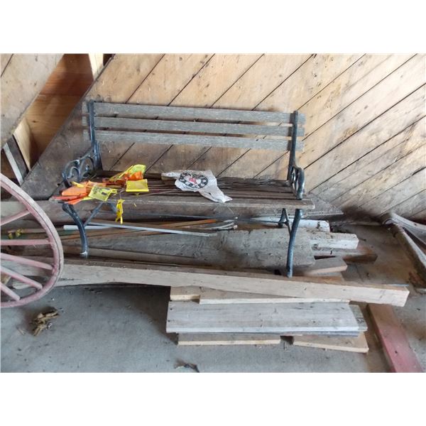 wood pile with metal bench