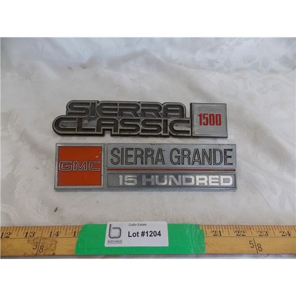 (2) GMC Sierra Truck Emblems, one metal one plastic