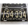Image 4 : (2) 1952 Sask Wheat Province Plates - #73-089 (paint chipping) + #154-334 (scratch on middle number)