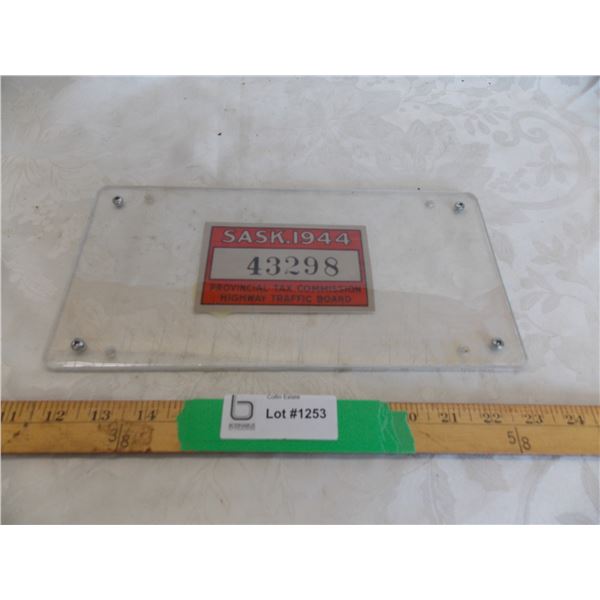 1944 (picture of license plate) in acrylic case