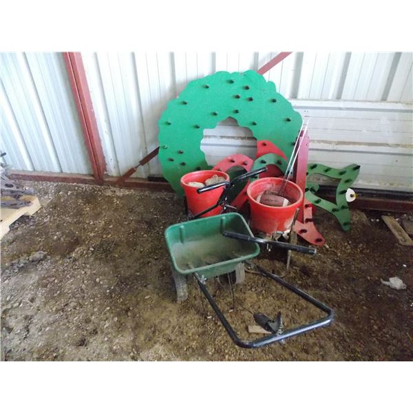 Lawn seeders, Christmas lights on plywood