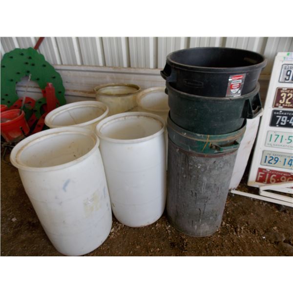 (6) plastic barrels + stack of garbage cans