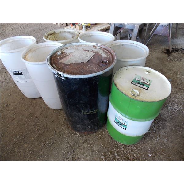(5) Plastic barrels and (2) metal barrels
