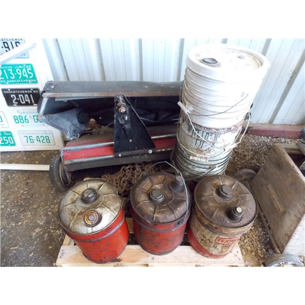 Pallet with Texaco + Two other Gas cans (with contents) and length of chain, misc