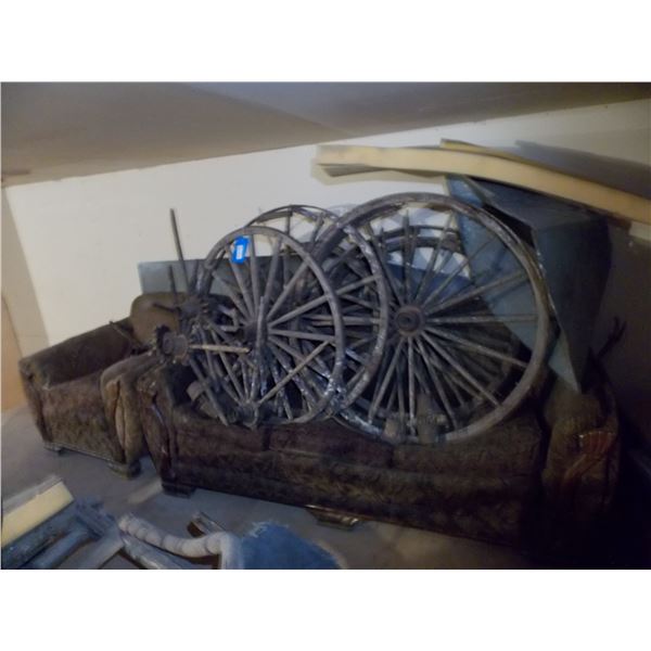 antique buggy wheels and hubs and couches - must take all - located upstairs