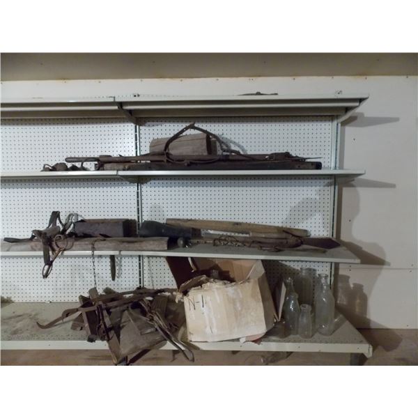 4 shelves of antique parts - horse related harnesses, milk bottles, etc - location upstairs