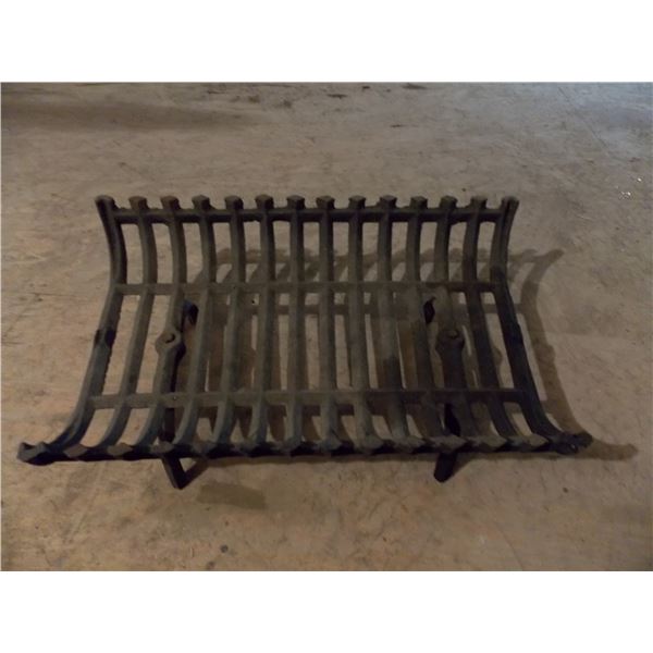 Cast iron fireplace wood holder - located upstairs