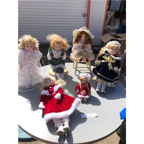 Assorted Porcelain Dolls: Wedding, Figure Skater, Christmas Themed (Chairs Not Included)