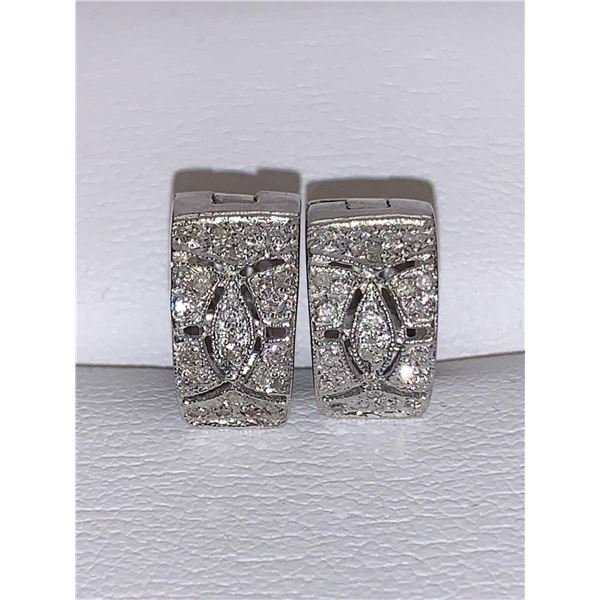 Ladies .925 Silver Diamond. 0.56 Carat Earring Appraisal $1200.00